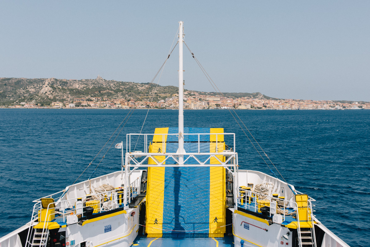 view of a maddalena lines ferry lifting its bridge for passengers and cars